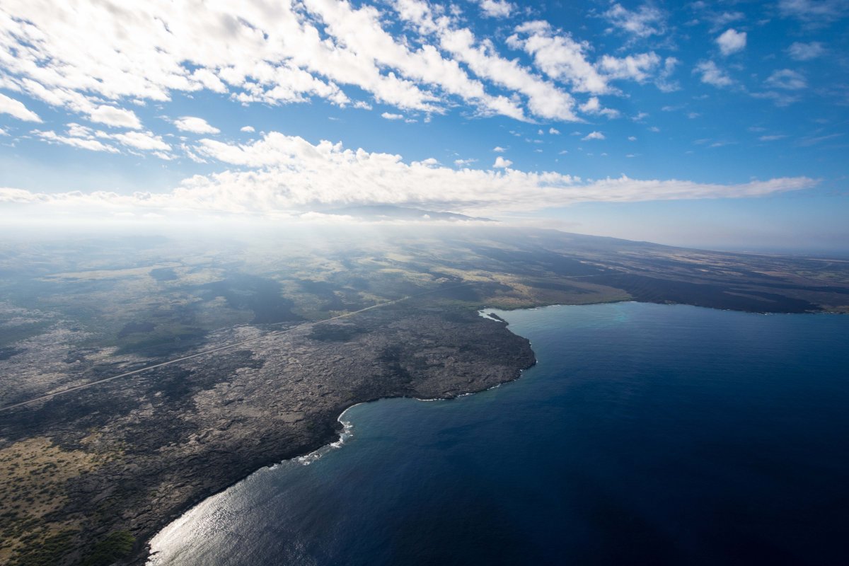 View of Big Island black volcanic coastline and new Hawaiiblack sand beaches - courtesy Shanon Searls..