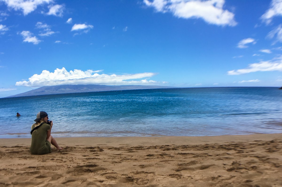 View of people sitting on Kaanapali Beach on Maui