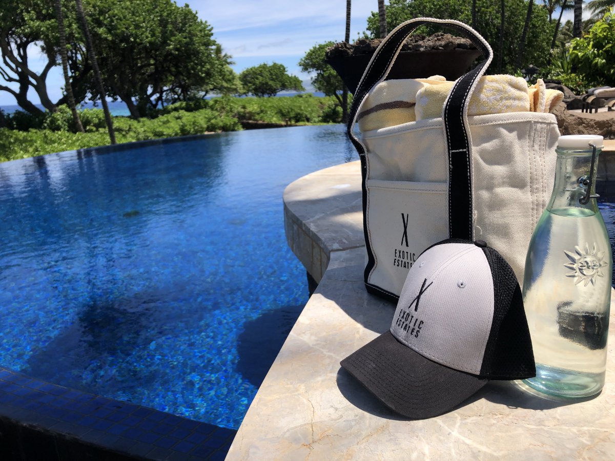 View of Exotic Estates beach bag by pool at oceanfront luxury vacation rental in Mauna Lani on the Big Island.