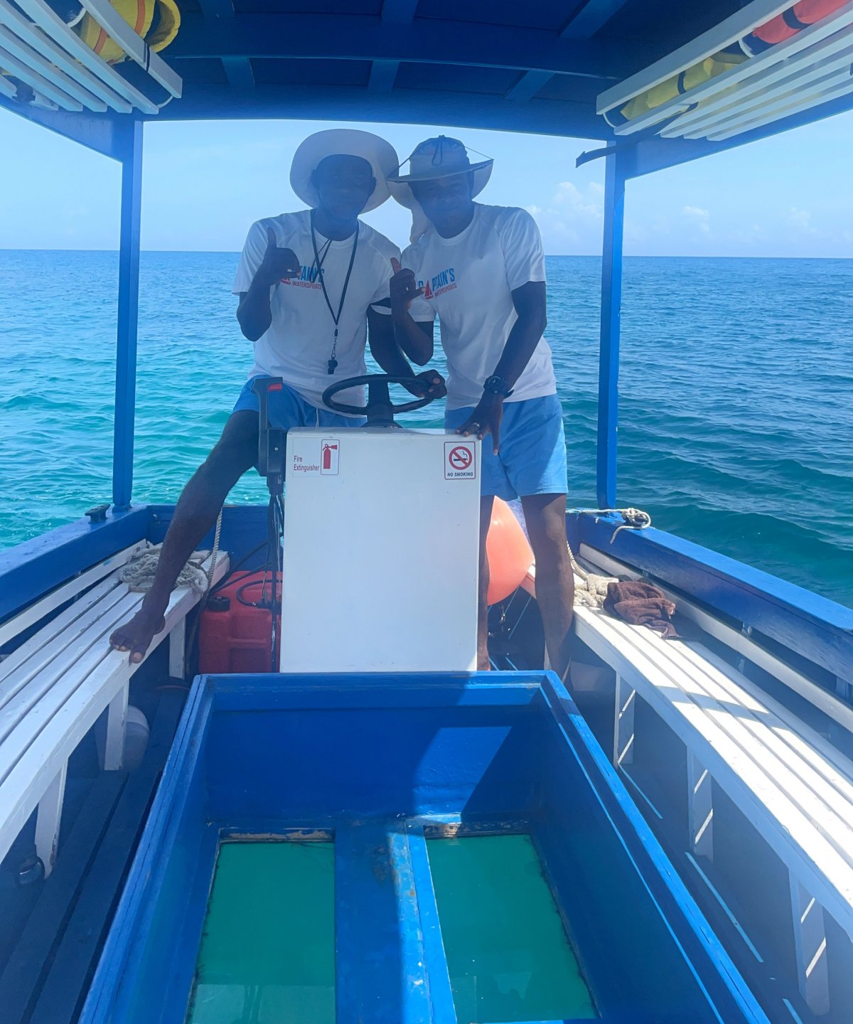 Captains on the Glass Bottom Boat Tour at Round Hill Resort in Jamaica