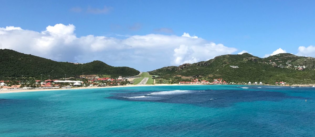 View of runway of Gustaff III Airport from the water off St. Barts