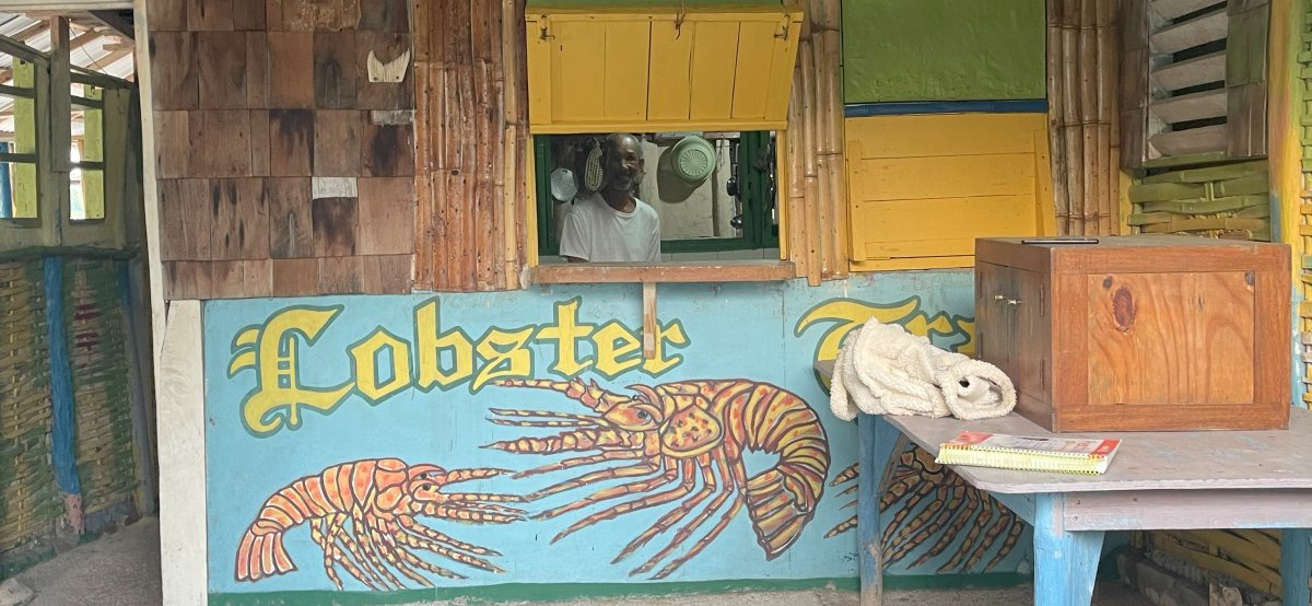 Friendly greeting at the Lobster Trap restaurant in Round Hill, Jamaica.