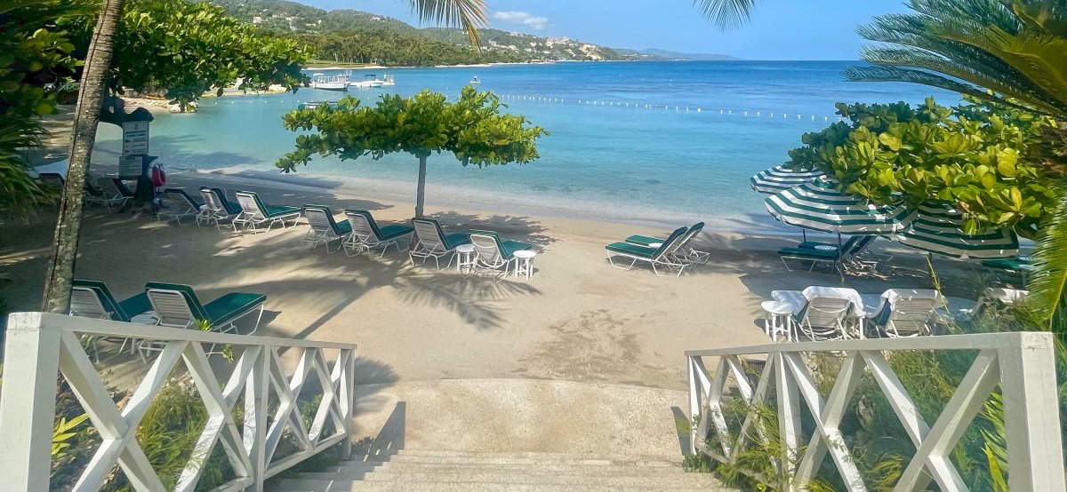 View of steps down to the beach in the Round Hill resort in Jamaica.