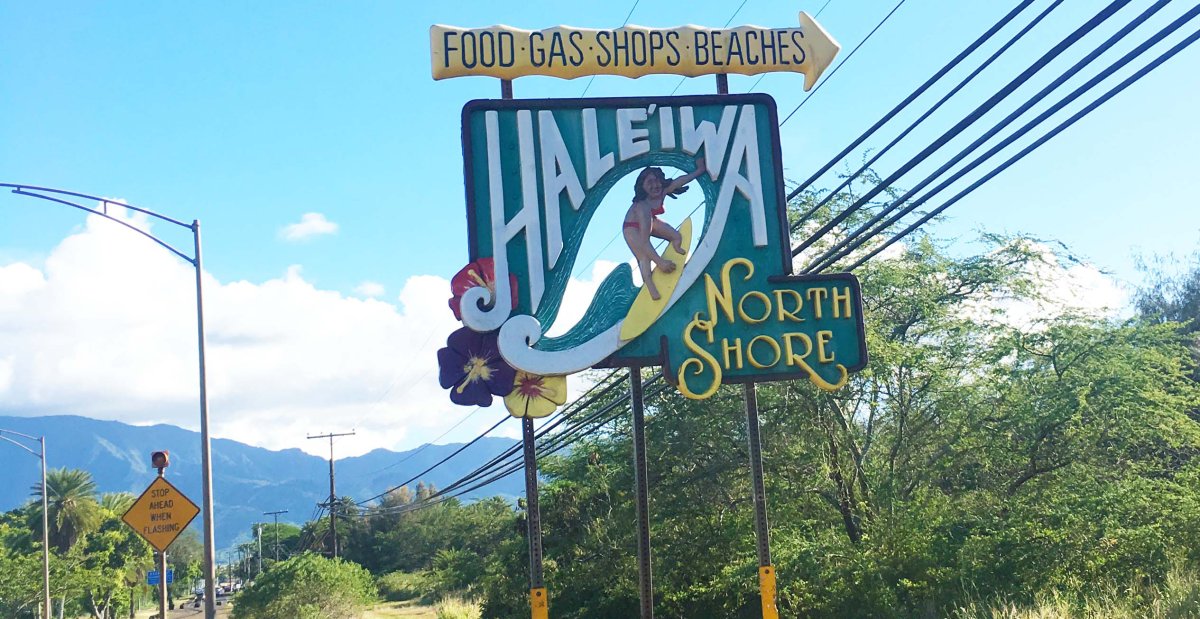 View of sign for Haleiwa on the North Shore of Oahu - John Di Rienzo