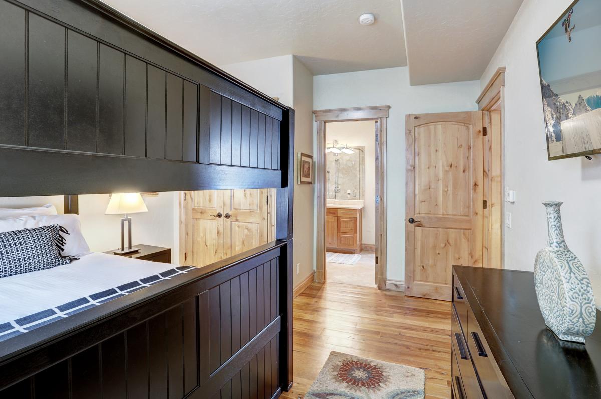 View from main level bedroom into shared bath