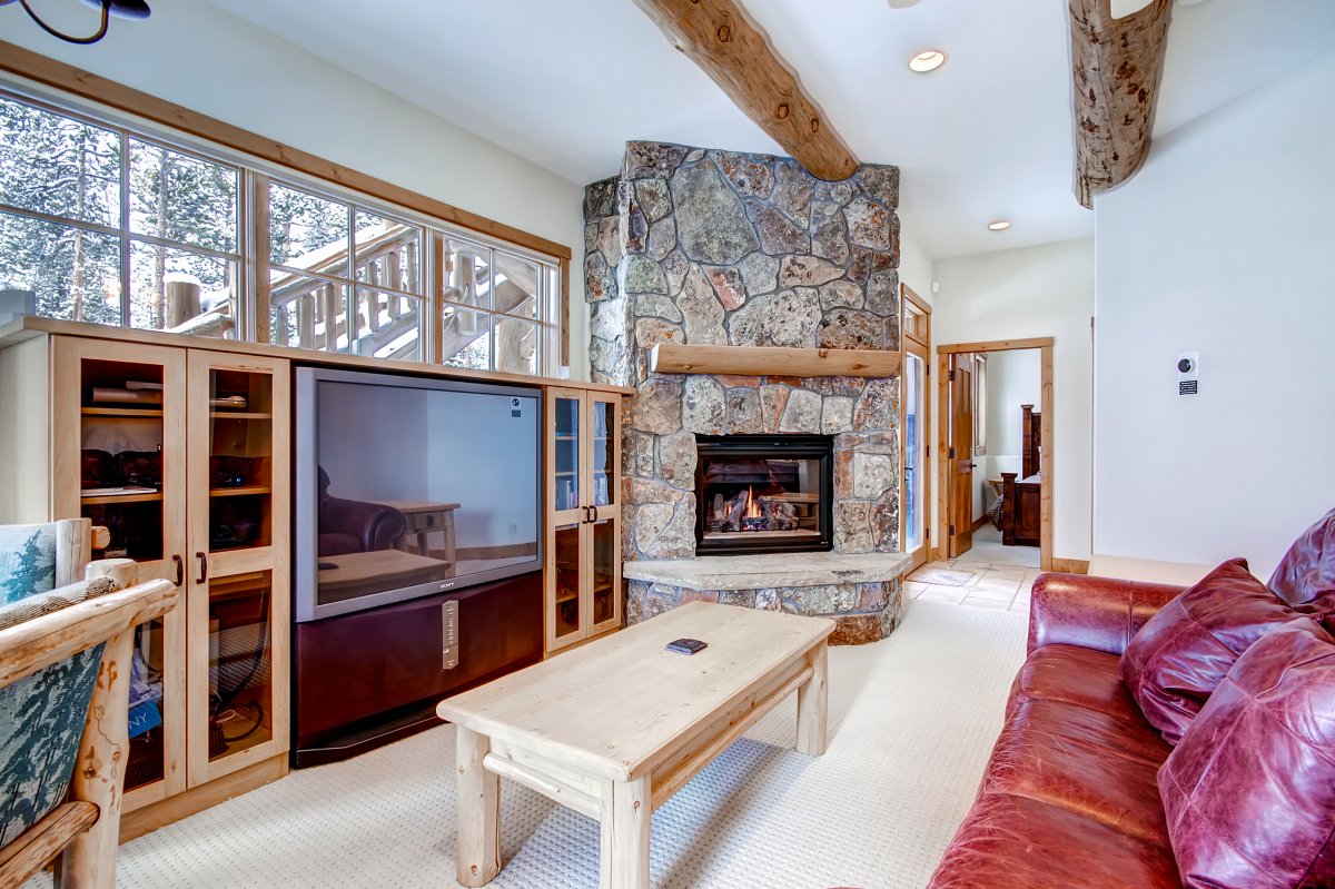 Family room with gas fireplace - Dunkin Hill Lodge Breckenridge Vacation Rental