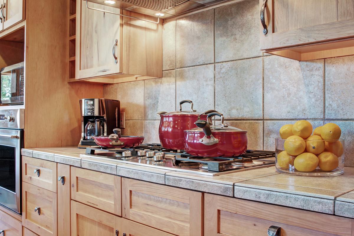 Large kitchen equipped with coffee maker, pots and pans, and all other utensils needed to make a delicious meal - Dunkin Hill Lodge Breckenridge Vacation Rental