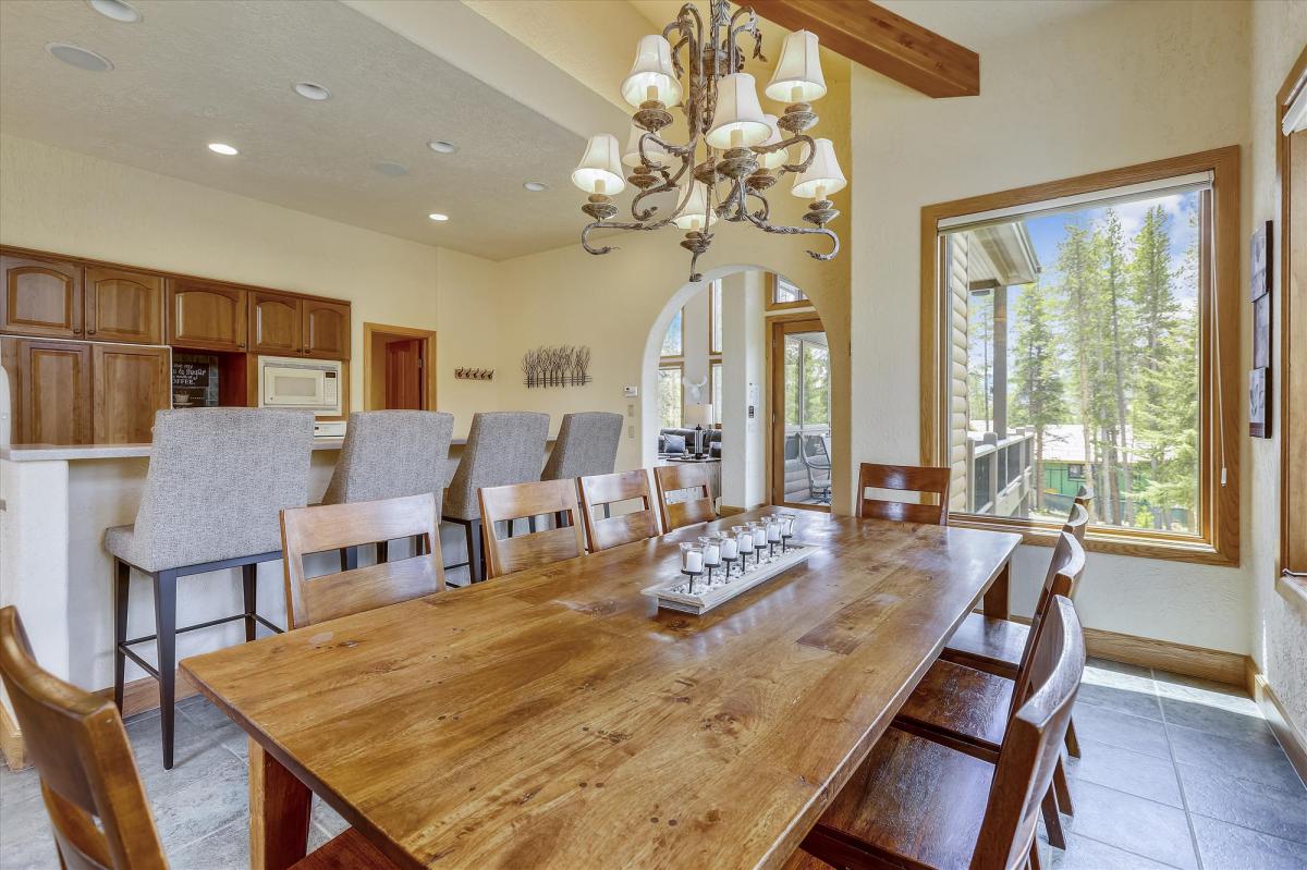 Dining room with 10 seating spaces and 4 additional spaces at the island bar - Evergreen Lodge Breckenridge Vacation Rental