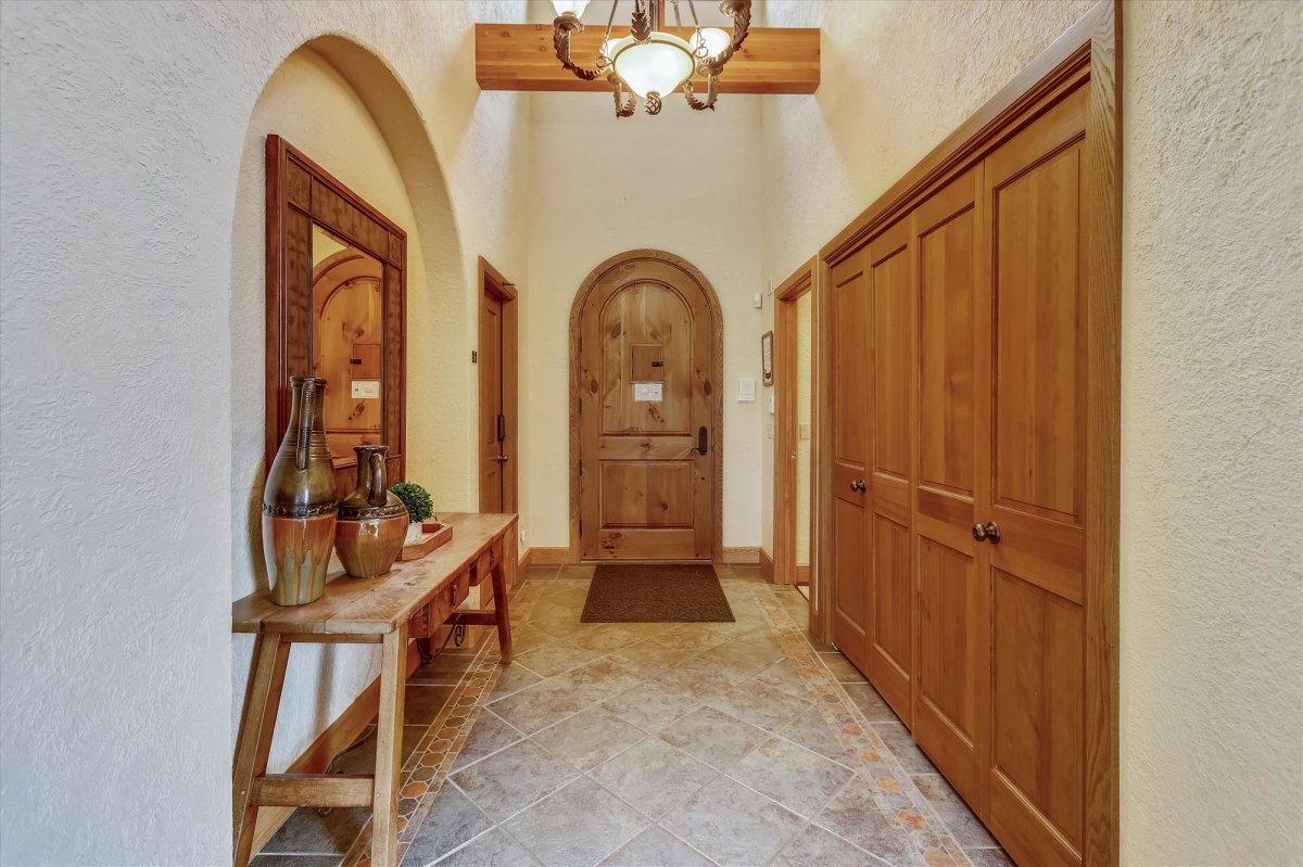 Entryway with coat closet and mudroom - Evergreen Lodge Breckenridge Vacation Rental