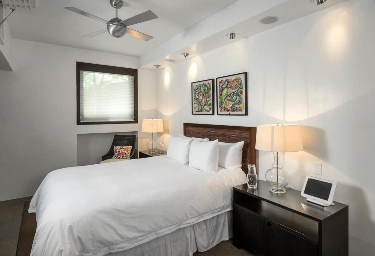 Crisp white walls and linens create an open and spacious feeling in each of the rooms at the Casa Oliver!