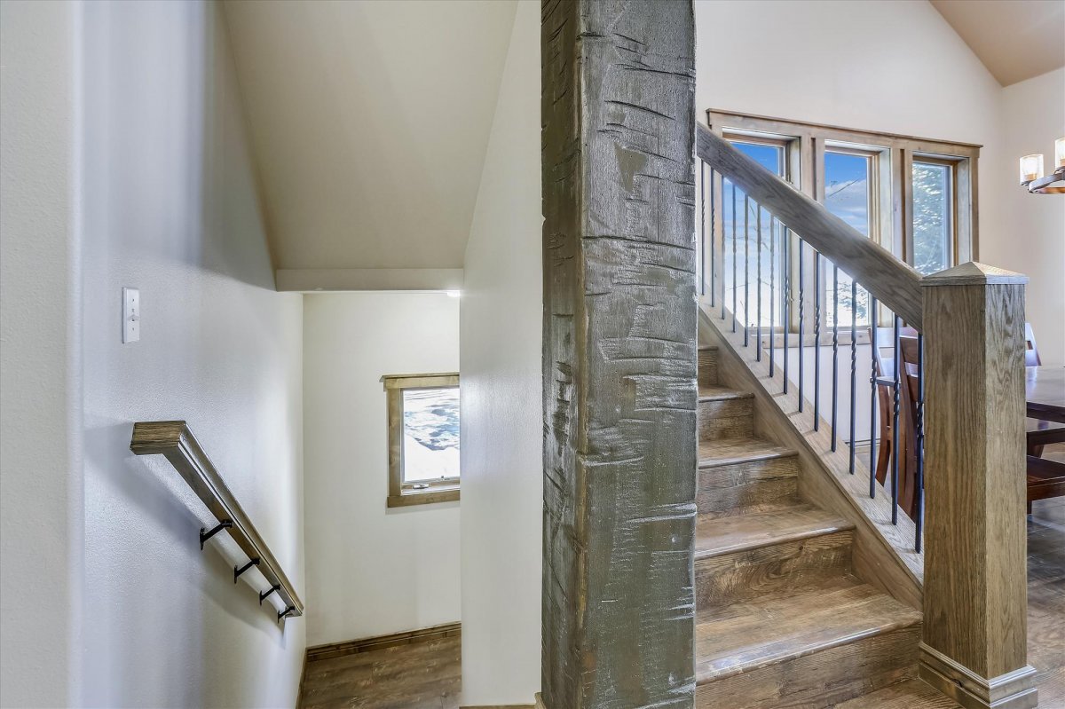 Stairway to upper and lower levels - Highwood Hideaway Breckenridge Vacation Rental