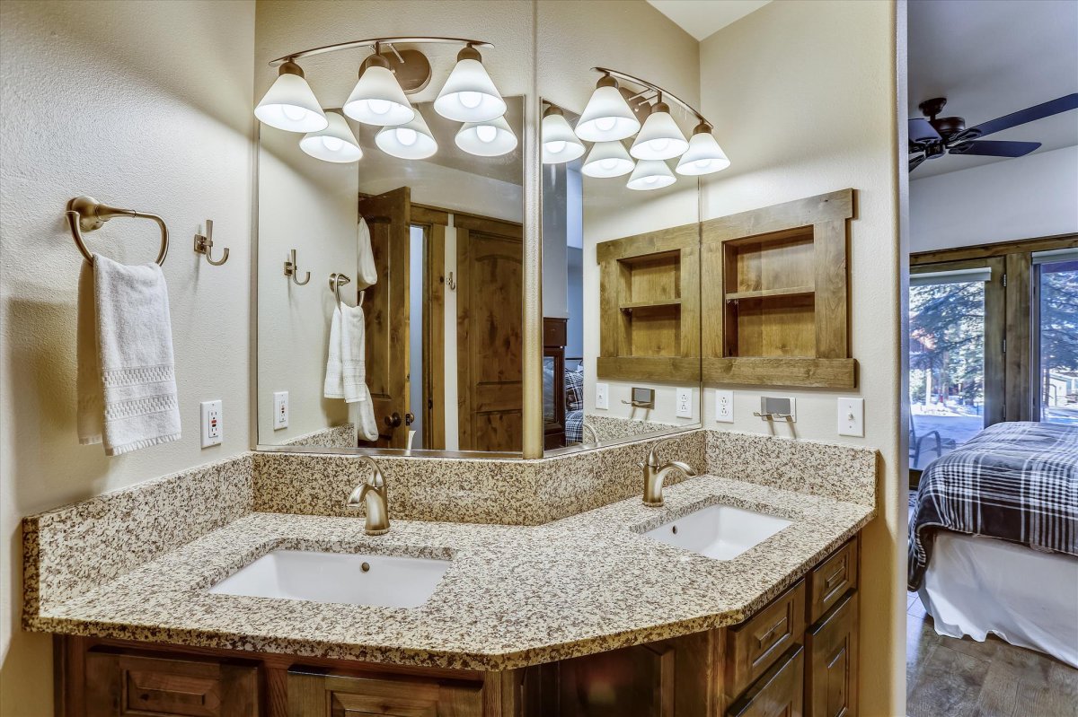 Lower level master bathroom with dual vanity sinks - Highwood Hideaway Breckenridge Vacation Rental