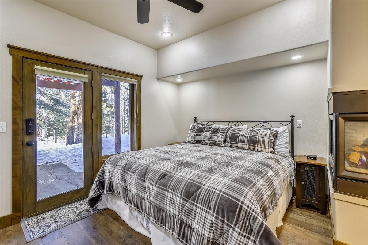 Lower level master bedroom with private door to the patio - Highwood Hideaway Breckenridge Vacation Rental