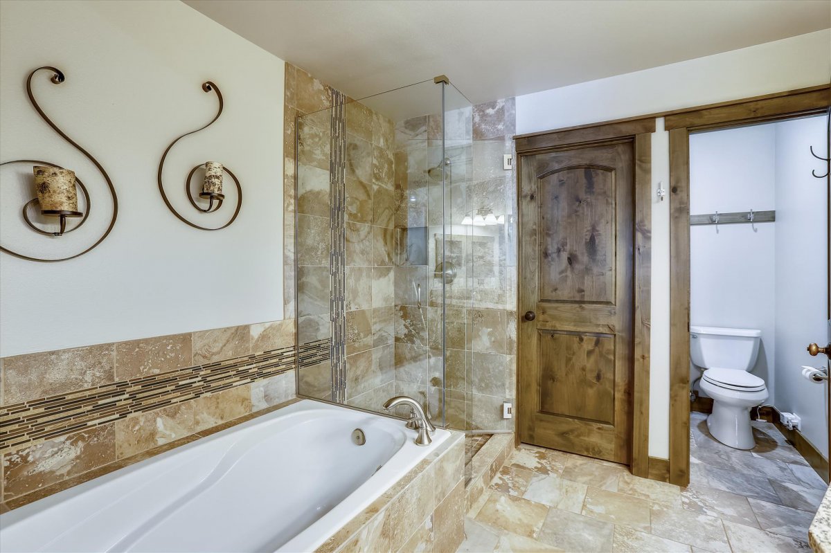 Large soaking tub and walk in shower - master bathroom - Highwood Hideaway Breckenridge Vacation Rental