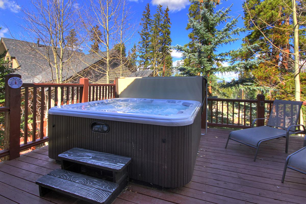 Soak in the hot tub on the deck - Highwood Hideaway Breckenridge Vacation Rental