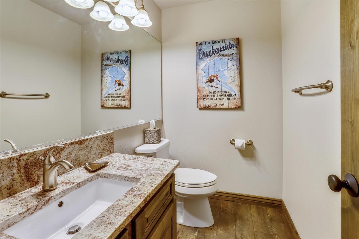 Half bath located on main floor - Highwood Hideaway Breckenridge Vacation Rental