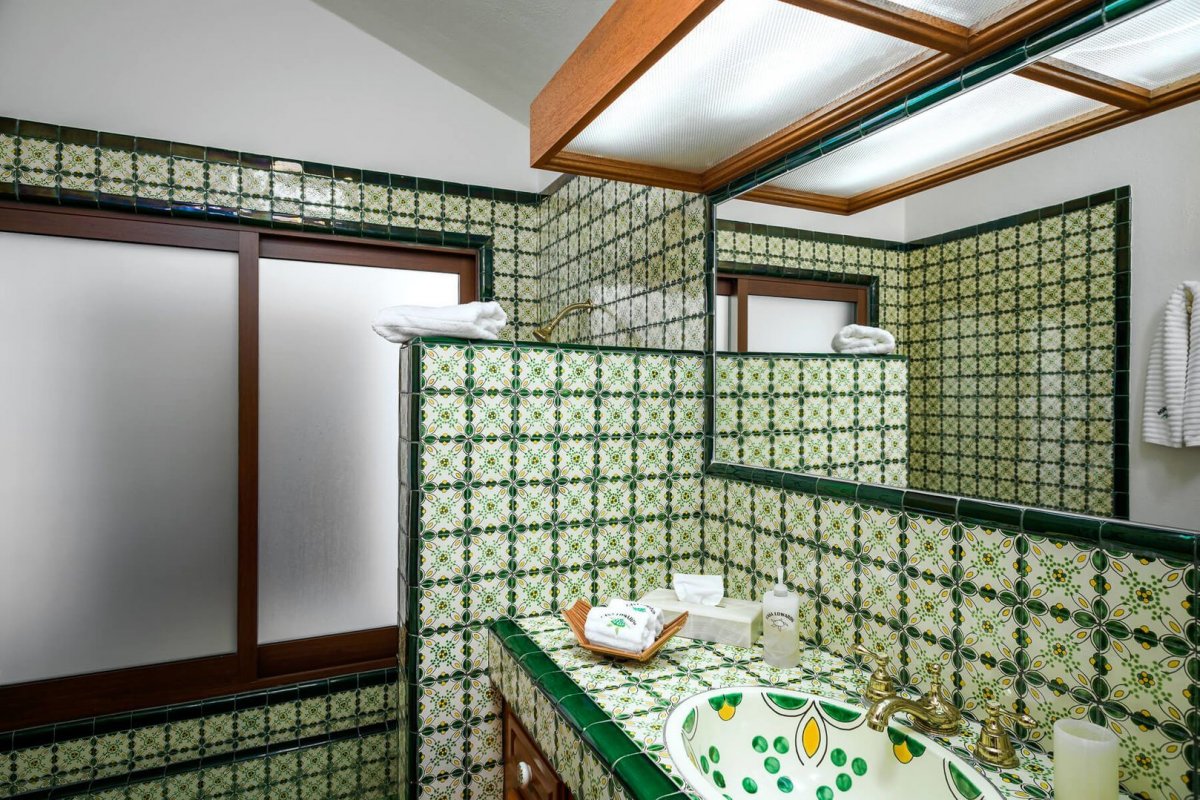 Splashed with bright colors and designs, the bathrooms also come with plenty of counter space!