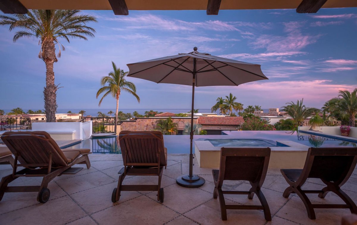 Appreciate the stunning view from the terrace while laying on one of the several lounge chairs at Villa Desierto