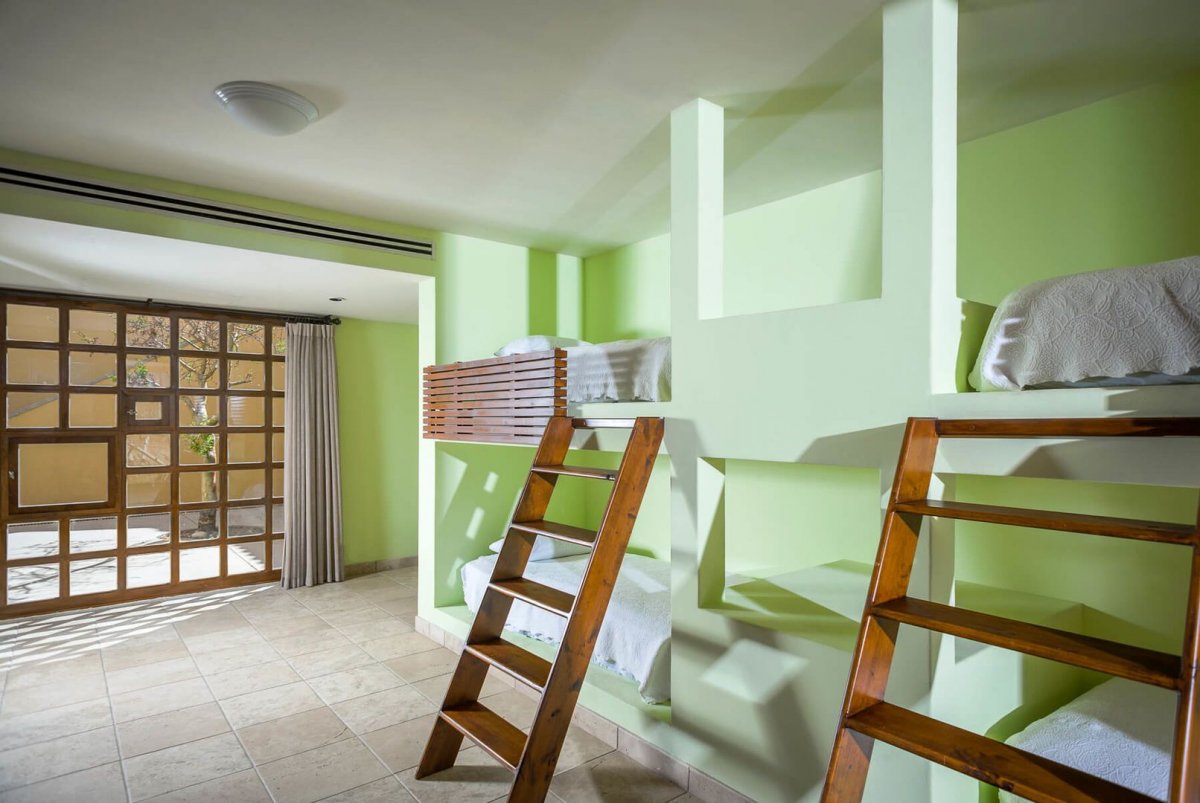 With 2 sets of twin bunk beds in three of the rooms in Casa Tita, you'll be able to maximize your guest list!