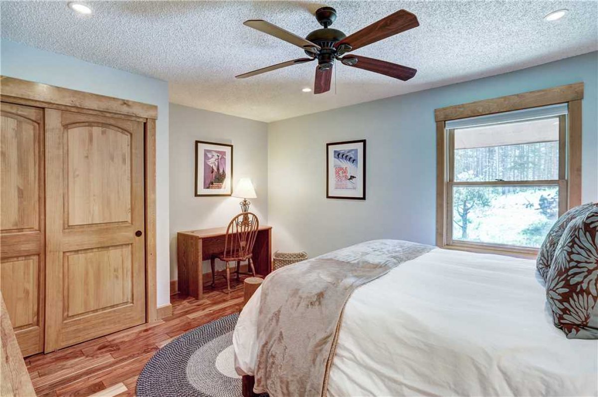 Upper level master bedroom with queen bed.