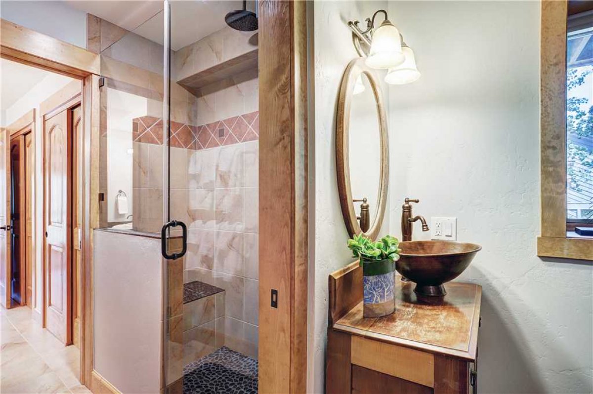 Lower level bathroom shared between the queen and bunk bedrooms.