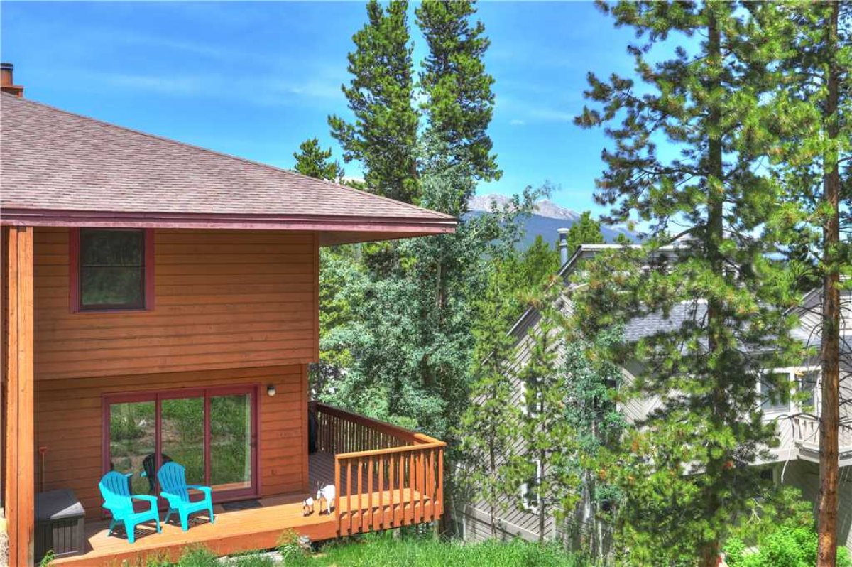 This home has many outdoor decks and seating areas to enjoy the mountain air.