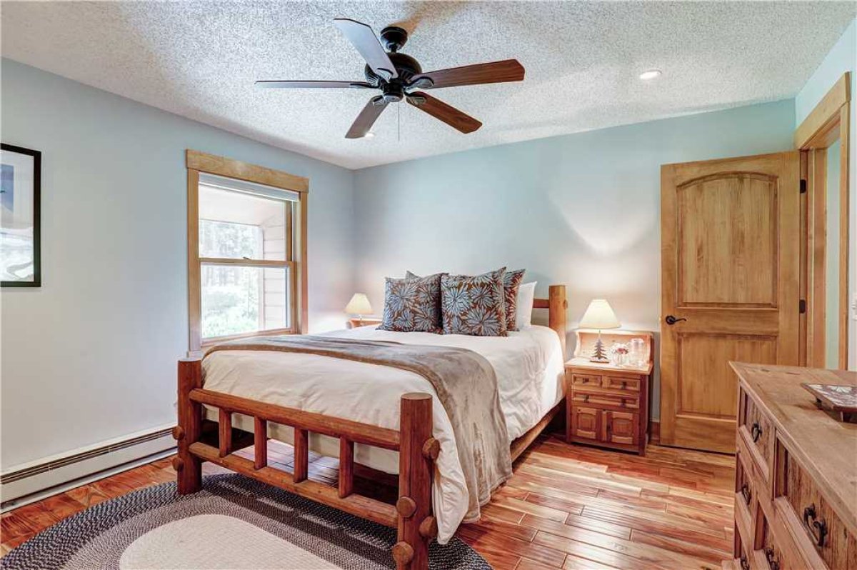 Upper level master bedroom with queen bed.