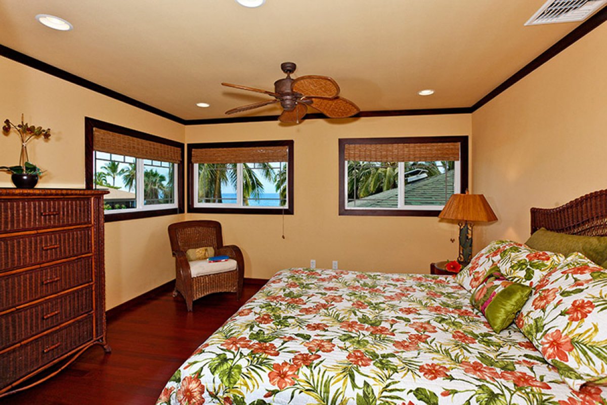 Upstairs queen bedroom one.