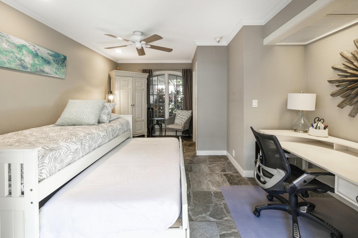 The room off the pool has a twin & twin trundle. No A/C.