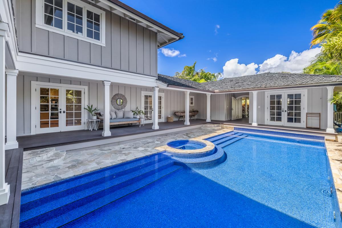 The courtyard welcomes you with a private pool, hot tub, shuffleboard, and space designed for easy days spent outdoors