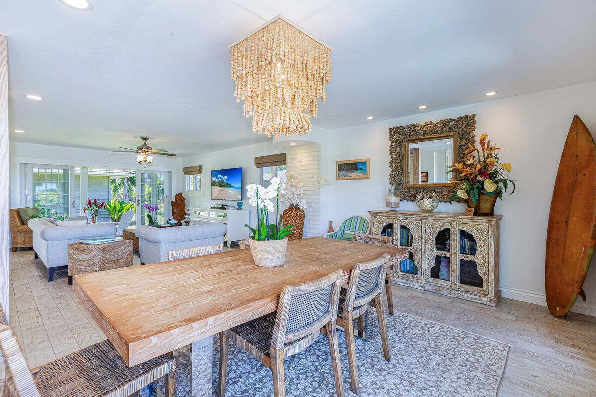 Gather around the spacious dining table for six, perfectly positioned for shared meals and conversation.