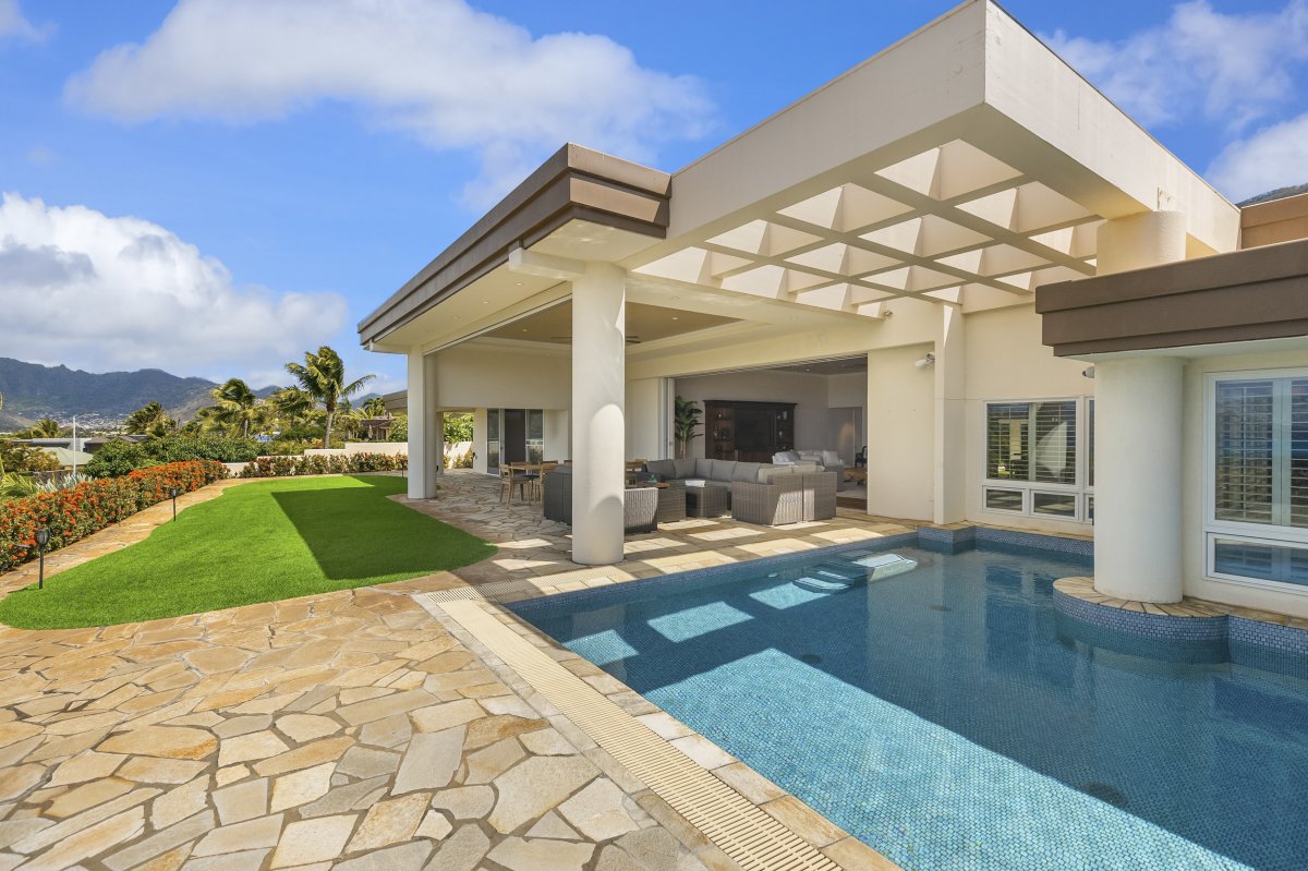 Hale Makana's yard view with a large swimming pool