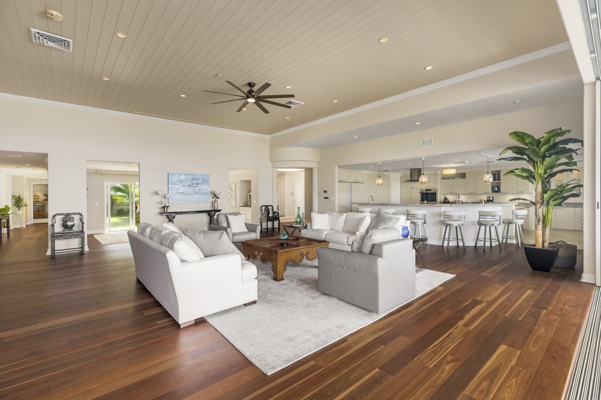 Hale Makana's open-concept design seamlessly connects the living, kitchen, and dining spaces