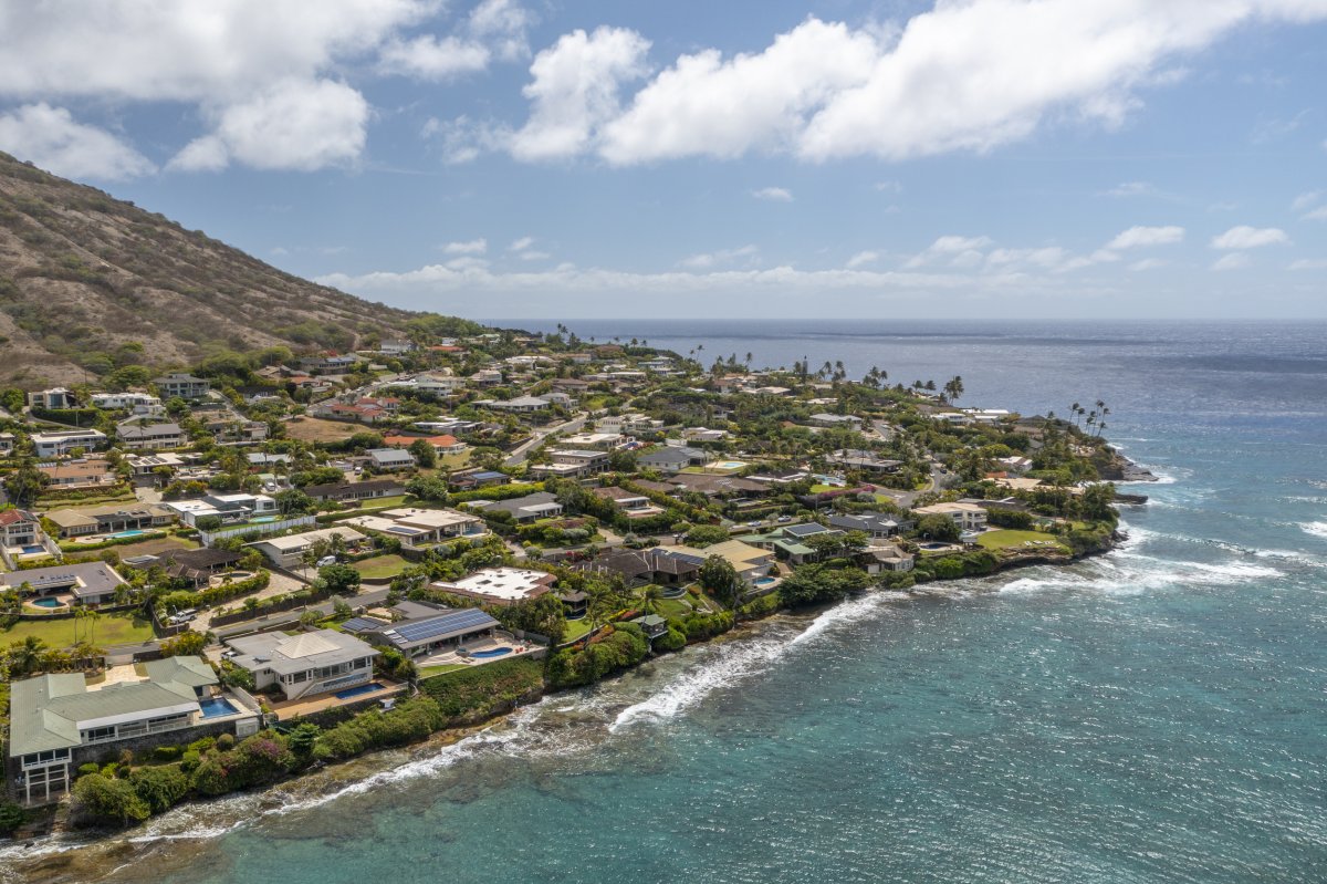 Beautiful aerial view of homes on Oahu overlooking the ocean