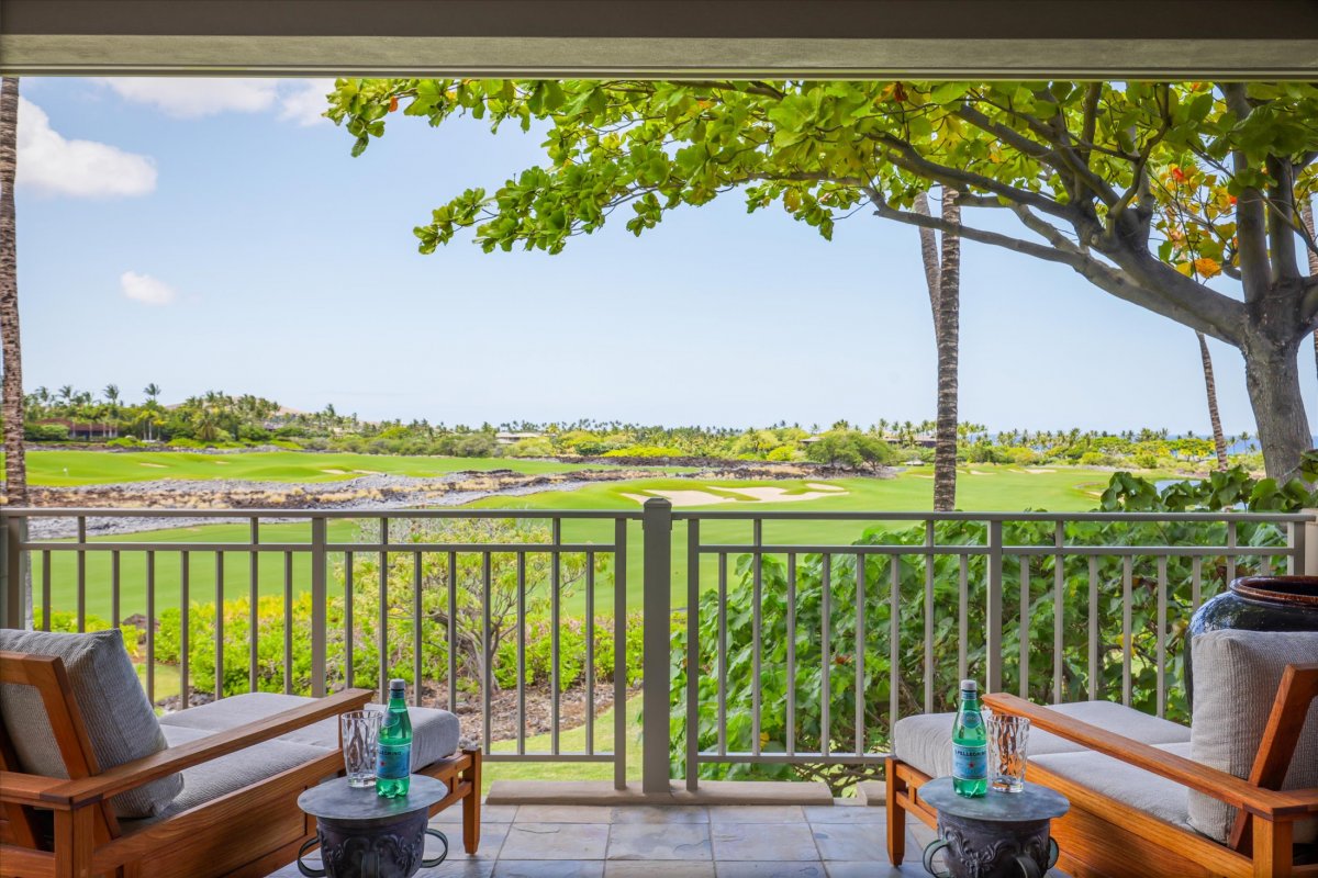 Private lanai with seating for two—enjoy a morning coffee or evening wind-down with panoramic views.