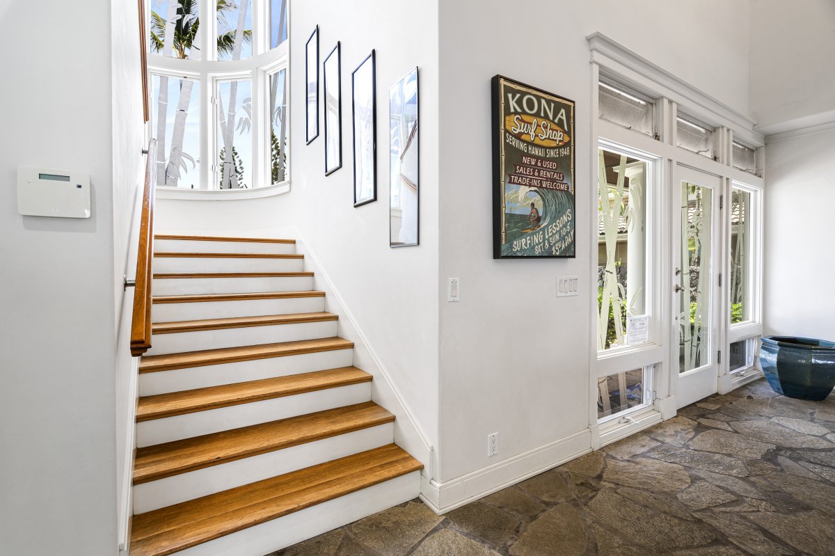 Stairway leading to the remaining bedrooms and media room