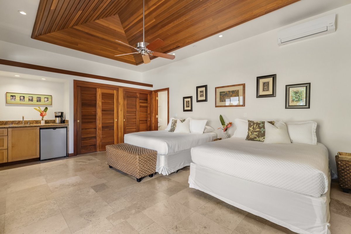 Hale Makai's Third Bedroom (Guest House) with two Queen beds, wet bar and flat-screen TV