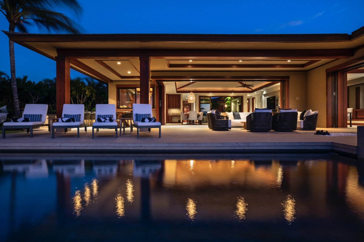 Pool, lanai, and home aglow at twilight—the perfect end to a perfect day in paradise.
