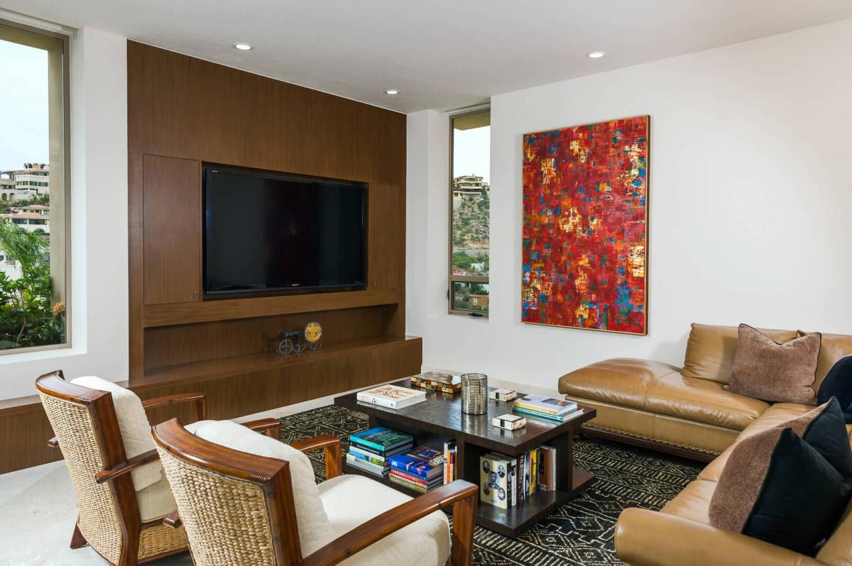 Gather together in the stunningly decorated modern entertainment room