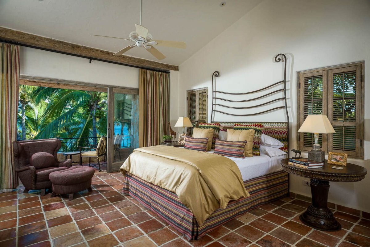 Ceiling fans are found throughout the villa including the bedrooms.