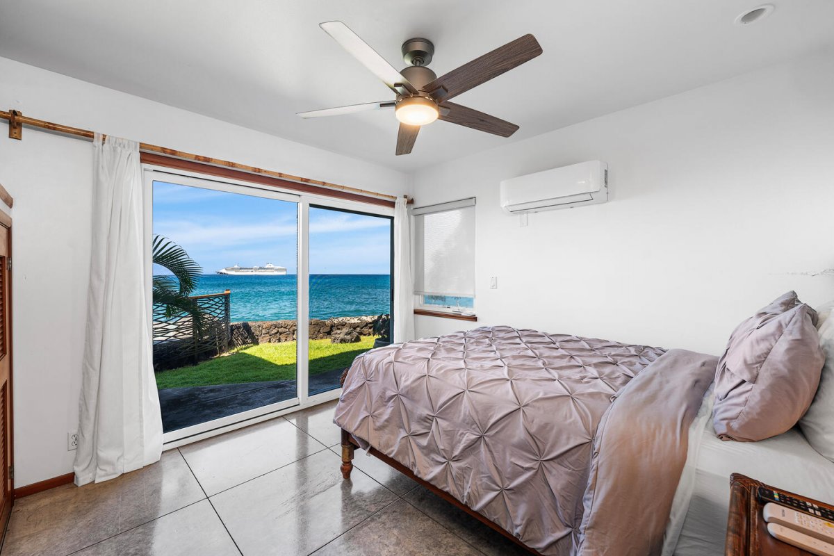 Private guest suite with ocean views and lanai access—wake up to waves and palms.