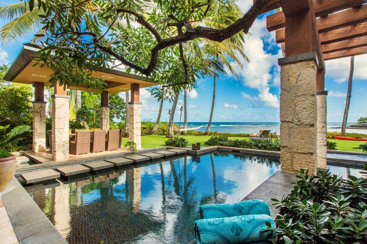 Pool with an oceanfront view at Banyan House on Oahu