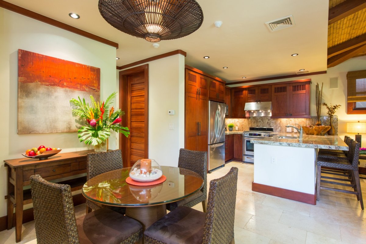 Dining Area and Gourmet Kitchen equipped with Stainless Steel Appliances