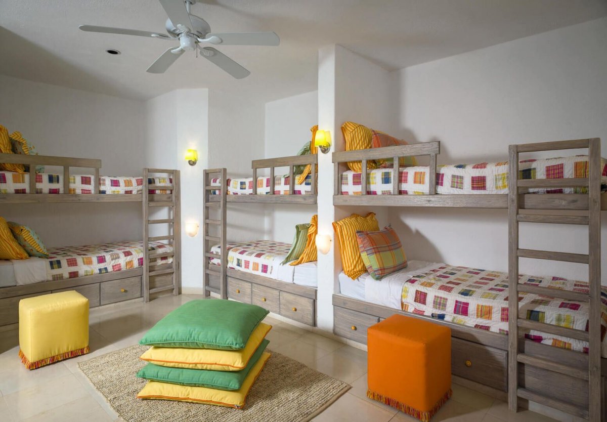 With three twin size bunk beds this bedroom is the perfect place for the kids!