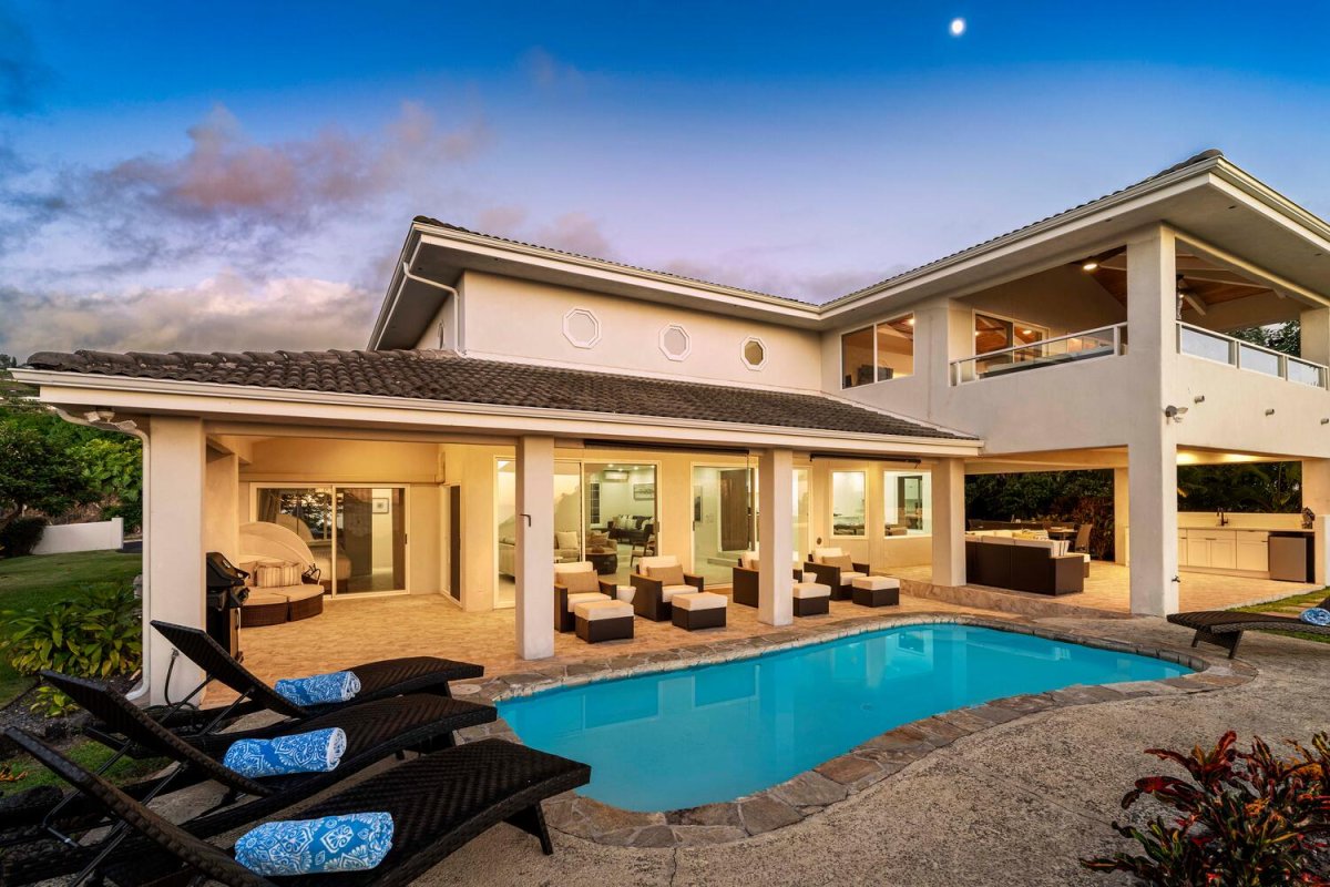 Embrace island living in this tranquil outdoor setting, perfect for sunset swims and serene evenings.