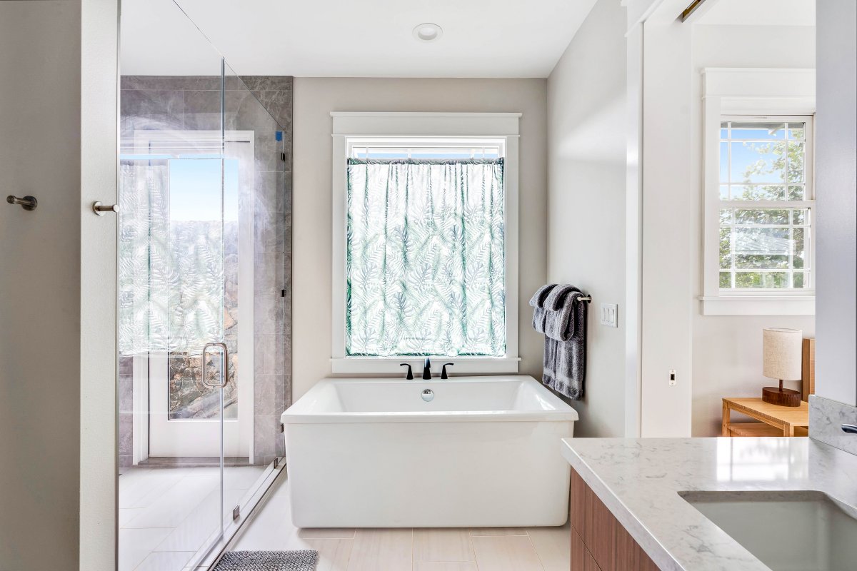 Downstairs ensuite with soaking tub and outdoor shower