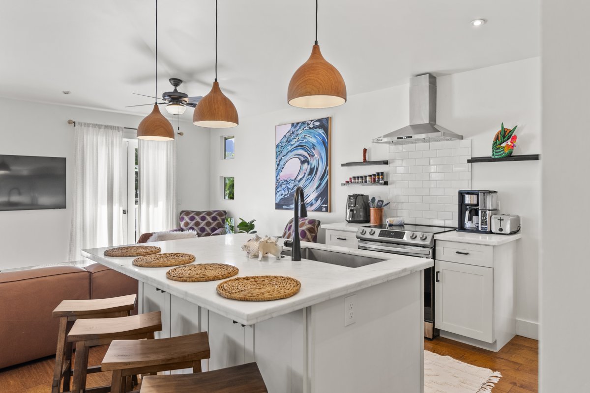 Kitchen area with top of the line appliances.