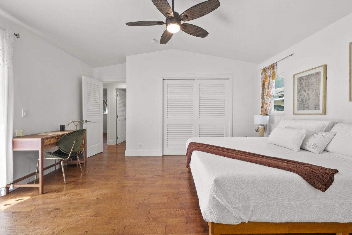 Minimalist bedroom design with a built-in closet to keep your getaway essentials.