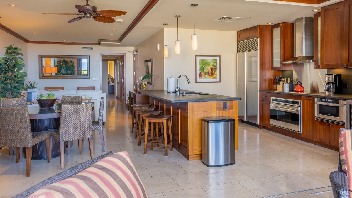 Breakfast bar seating at the kitchen and an open floor plan.