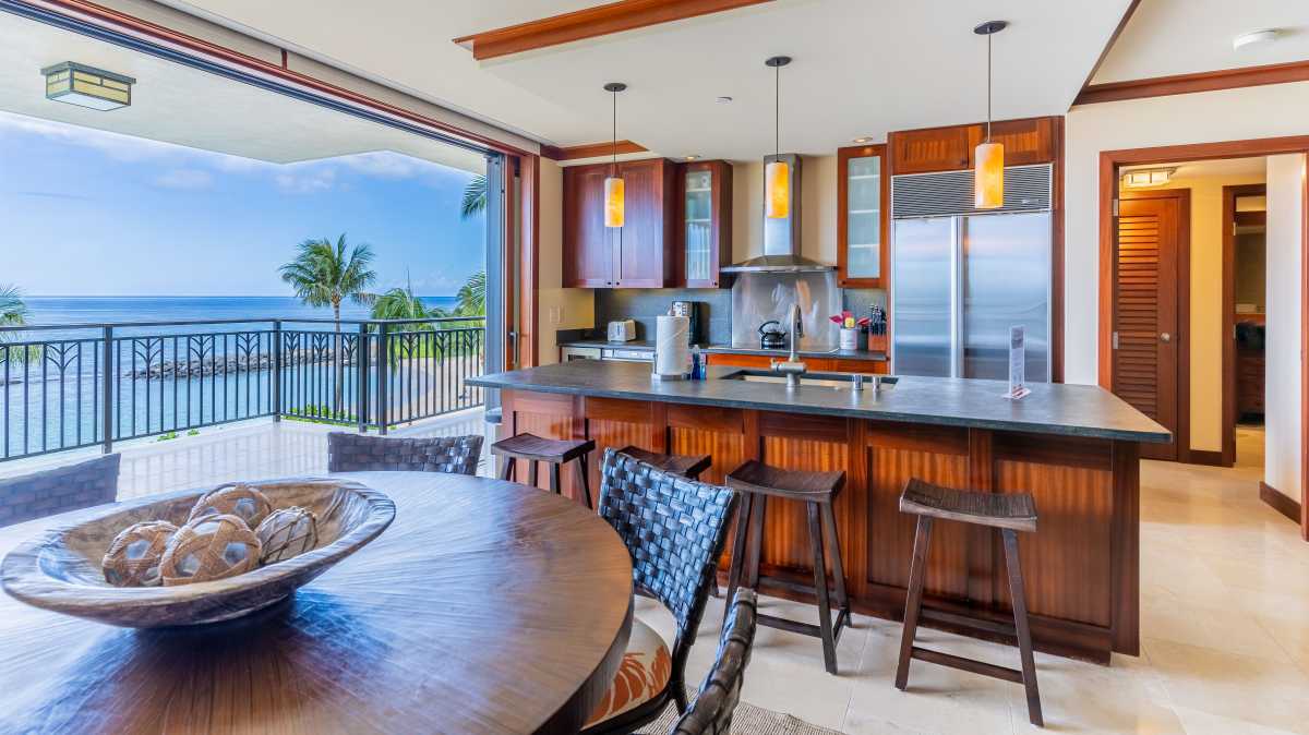 The fully equipped kitchen designed by Roy Yamaguchi with panoramic views.